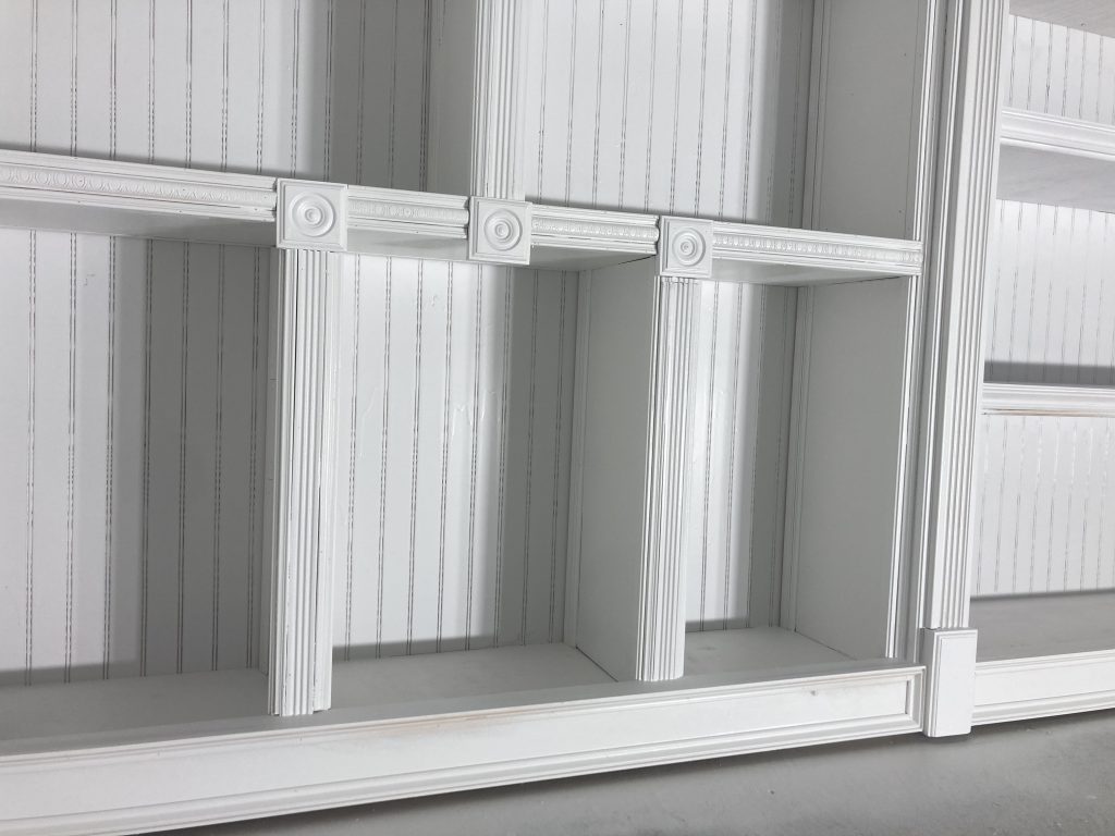 Close detail of the shelf edge and moulding work