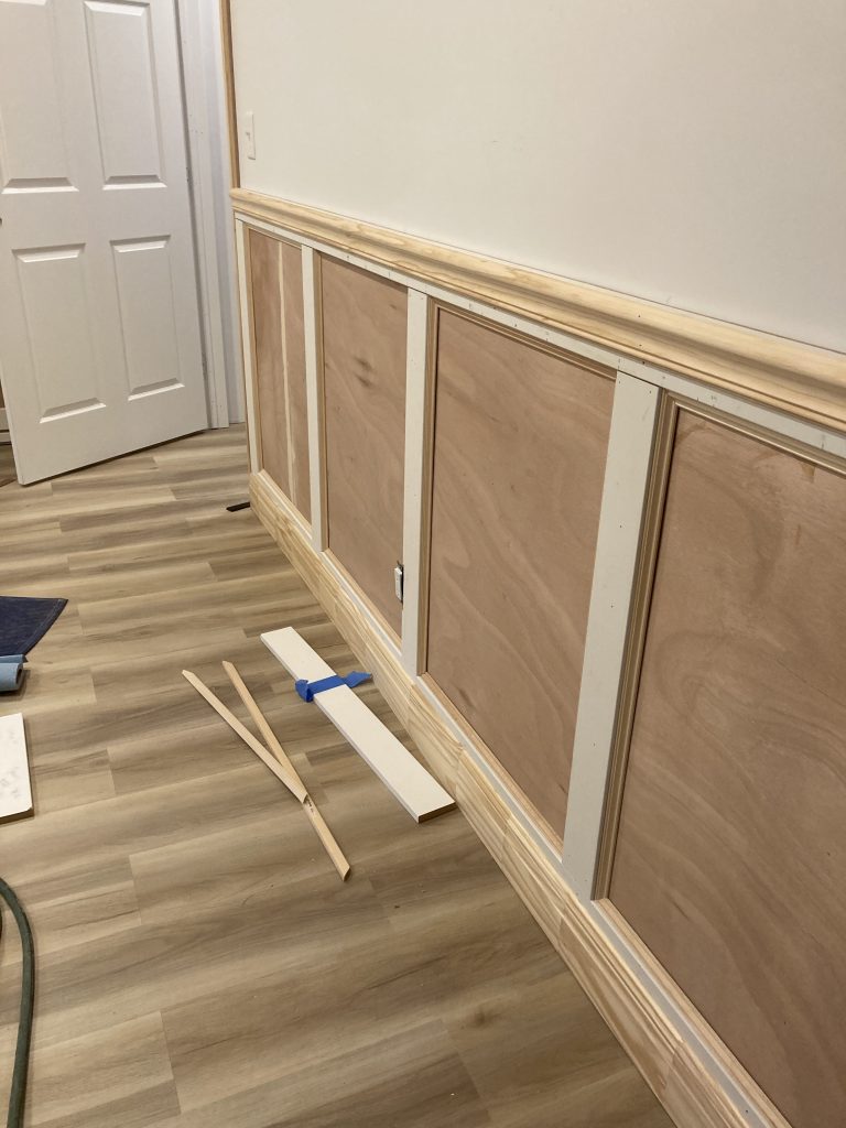 Large box style wainscoting panels installed on the wall