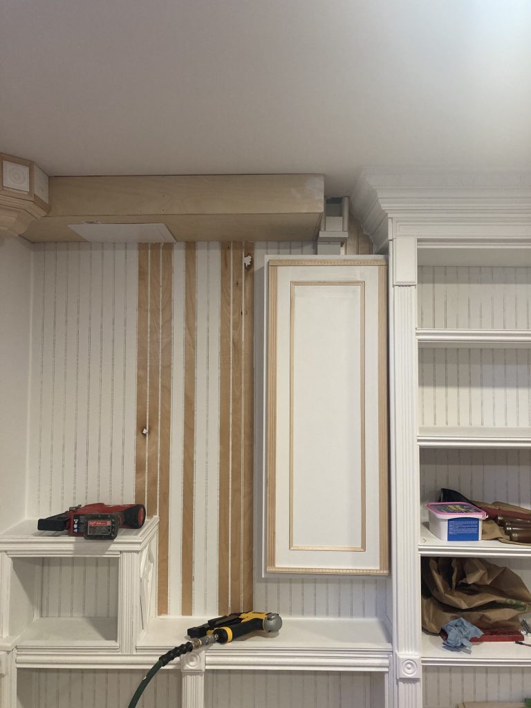 Cabinet enclosing the water main shut off while keeping it accessible