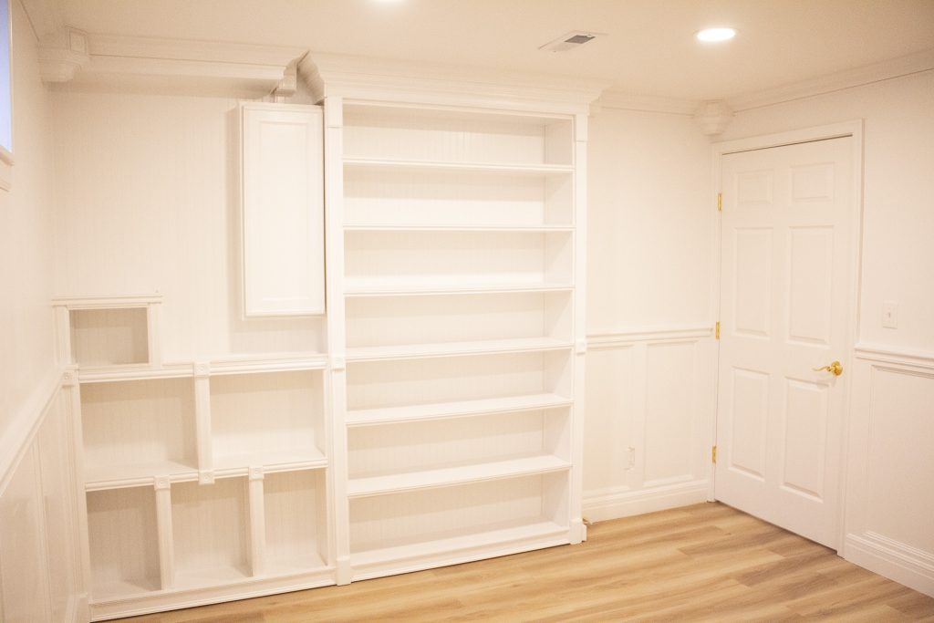 Finished built-in bookcase next to the office door