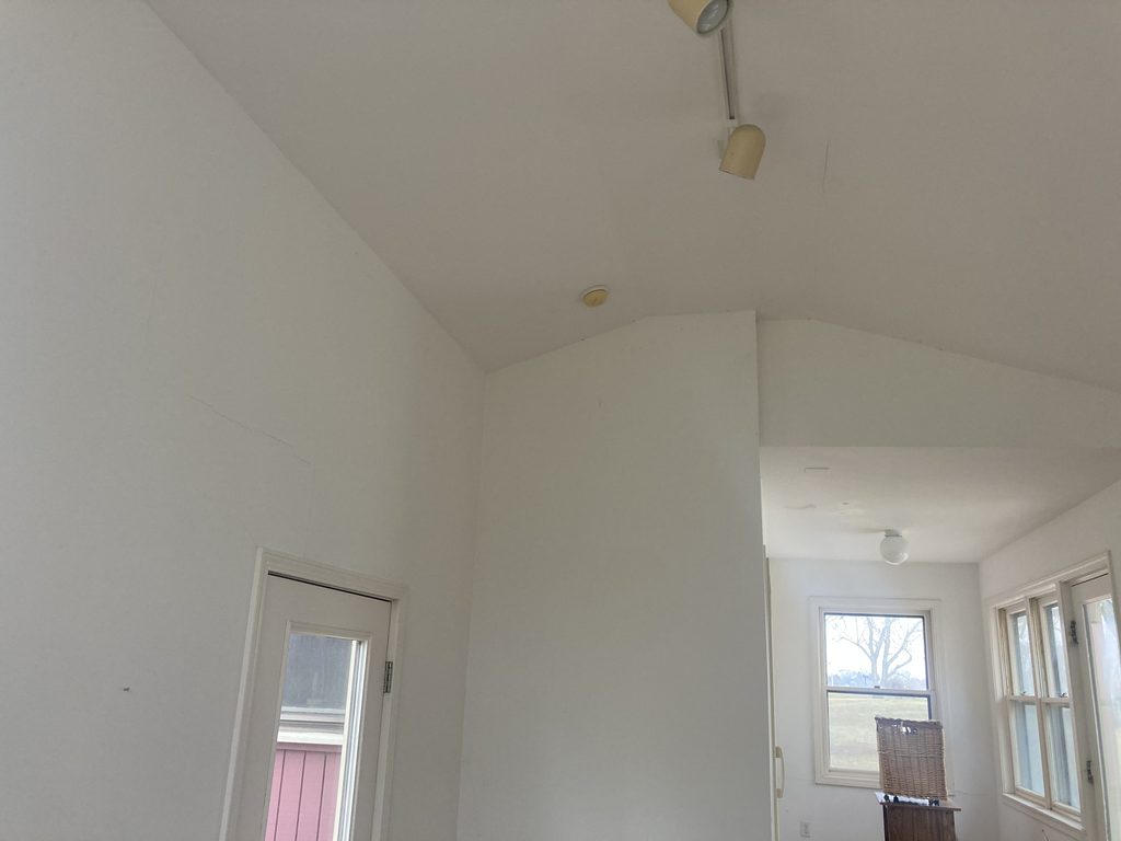 Sunroom ceiling and side door viewed from below before the drywall and paint work.