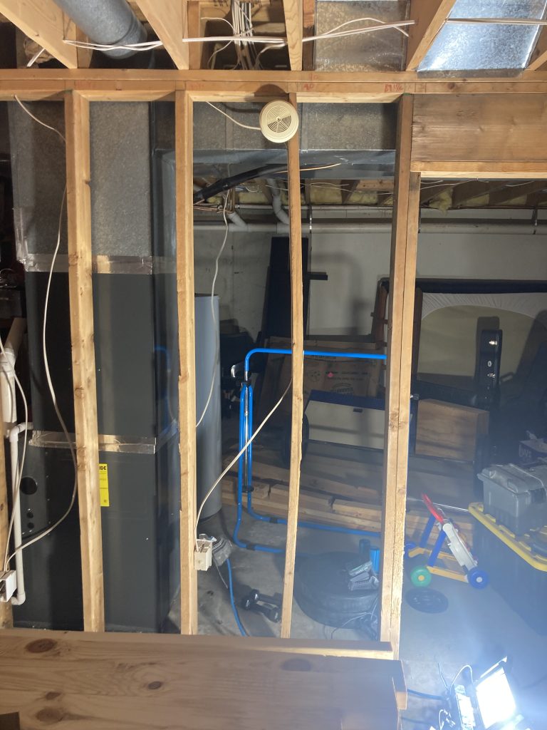 A 2x6 bending under load where the structural top plate had been notched through
