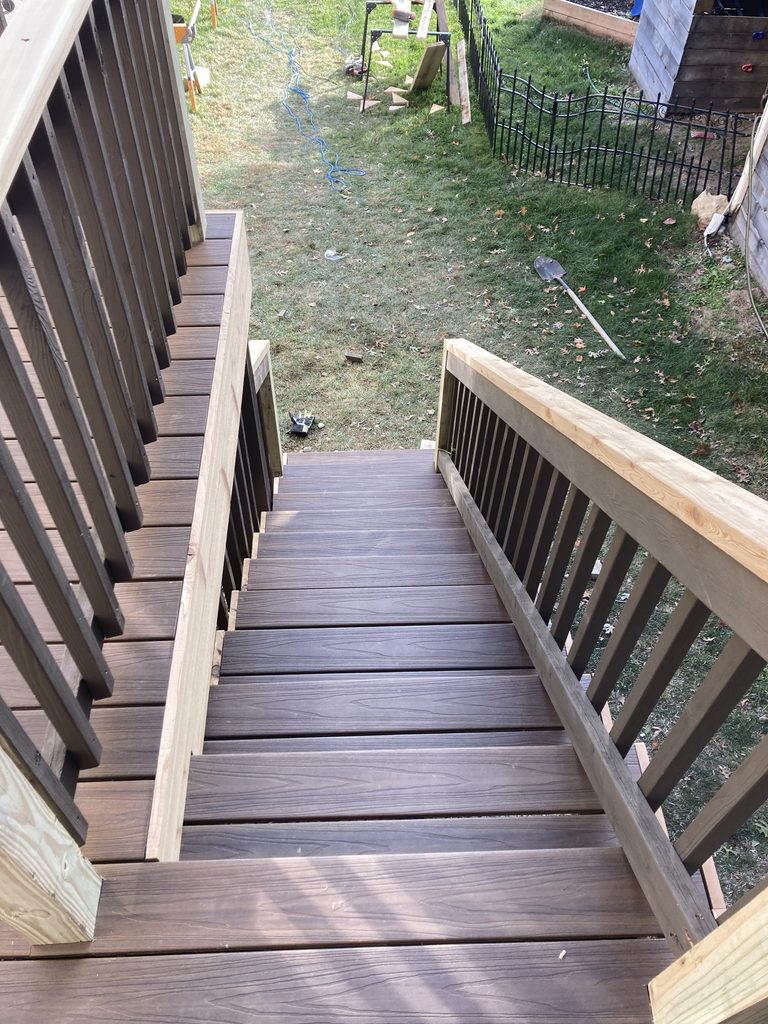 Finished deck stairs viewed from the top landing
